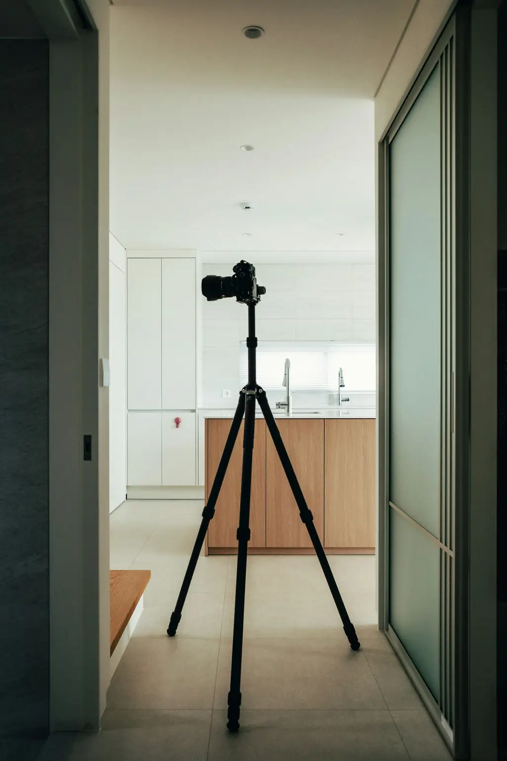 Photographer capturing listing photos inside a Kansas City rental home