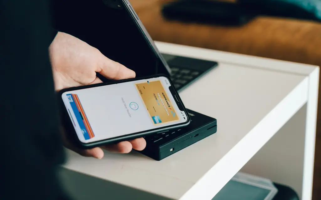 Resident paying rent through a phone app, with the payment deposited to the owner